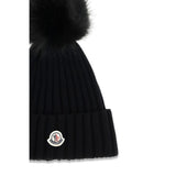 Moncler Svart Merinoullsmössa med Tofs