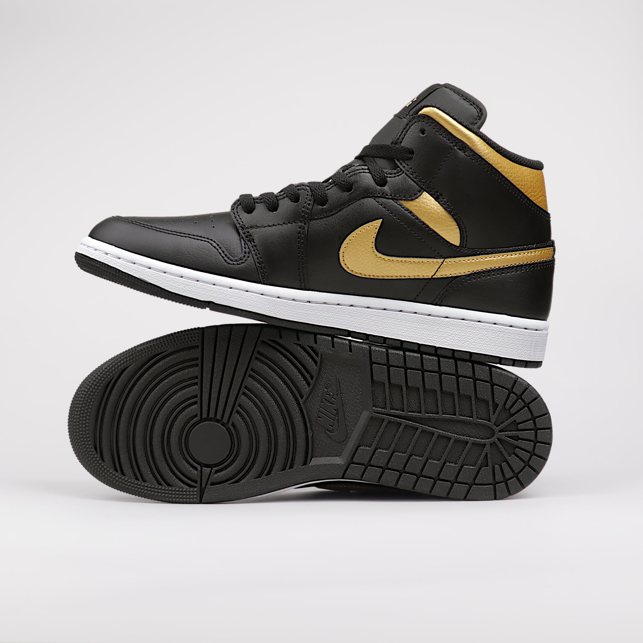 Jordan 1 Mid Black Metallic Gold