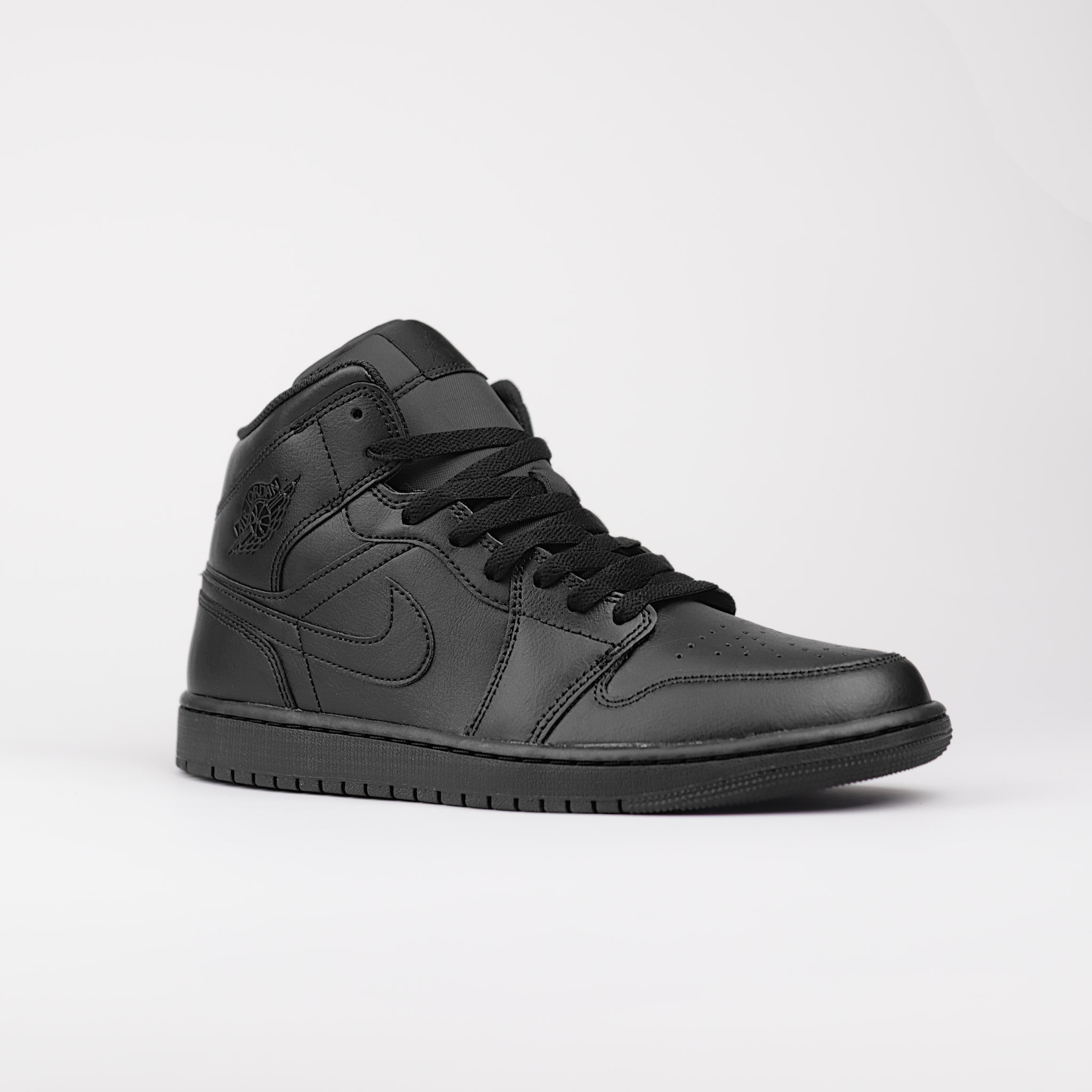 Jordan 1 Mid Triple Black